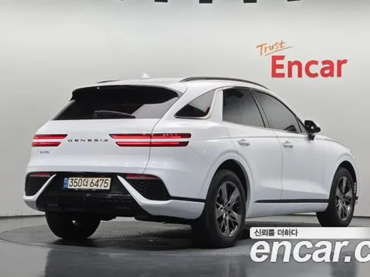 Genesis Gv70 — تك توب