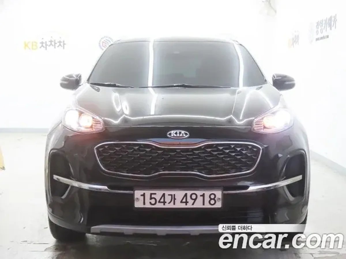 KIA Sportage — تك توب